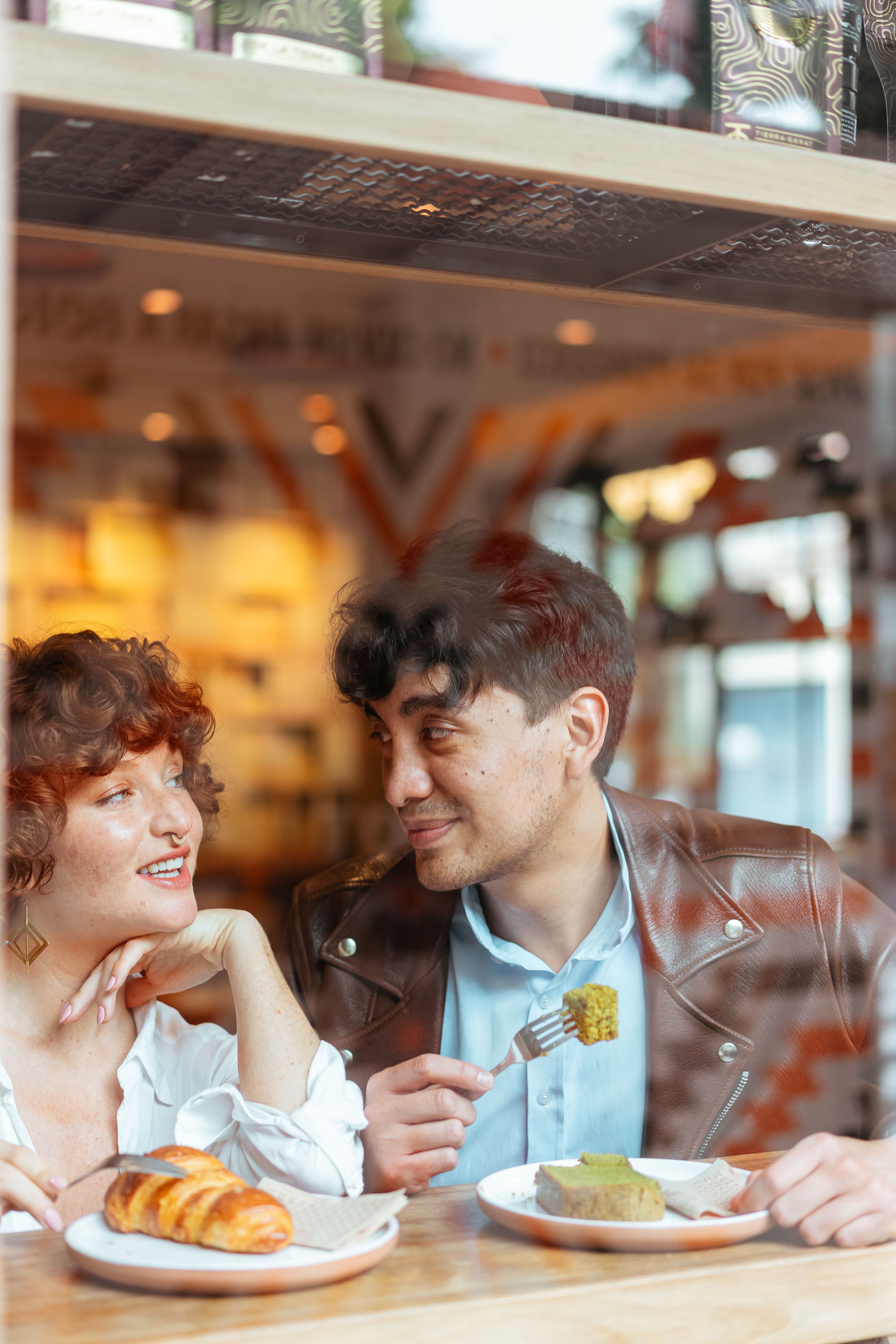 Two people laughing together